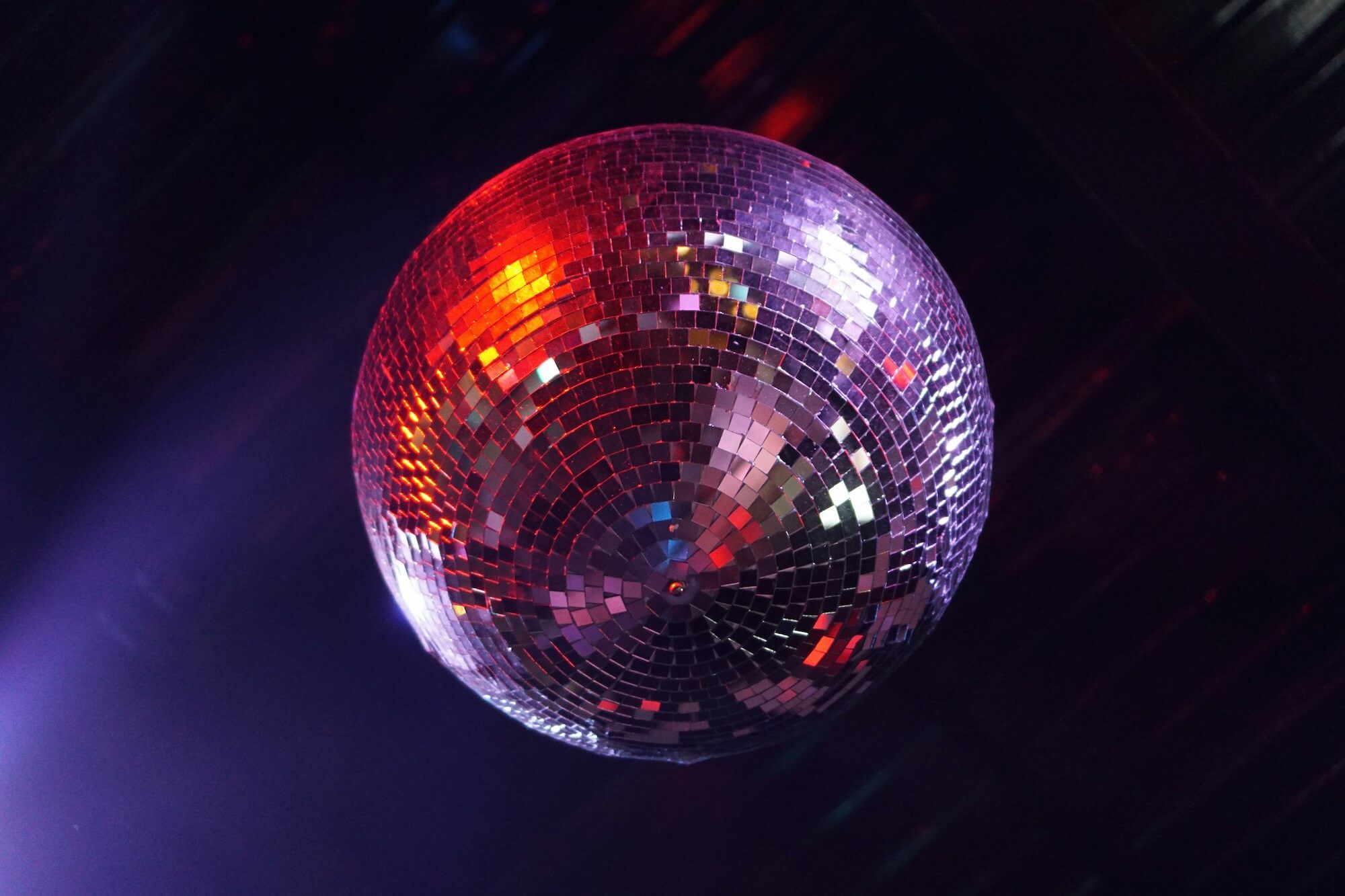 Image of disco ball to entice the community to come hang out with us during our grand opening event.